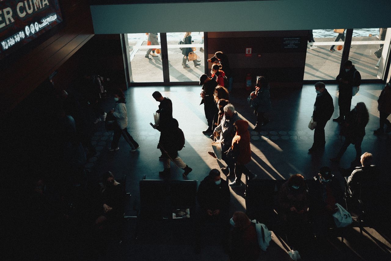 Travelers waiting at an airport